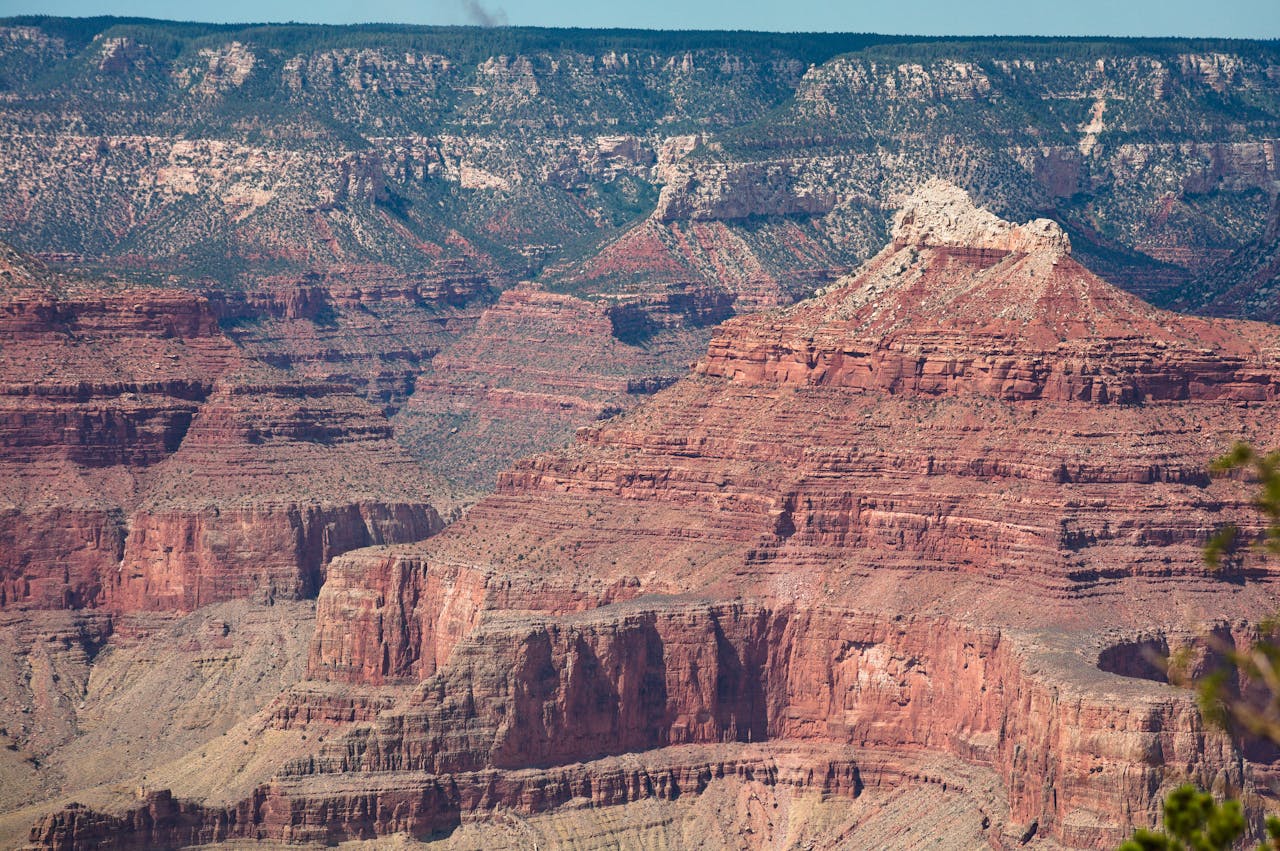 Stunning aerial view of the Grand Canyon's iconic red rock formations in Arizona, USA.