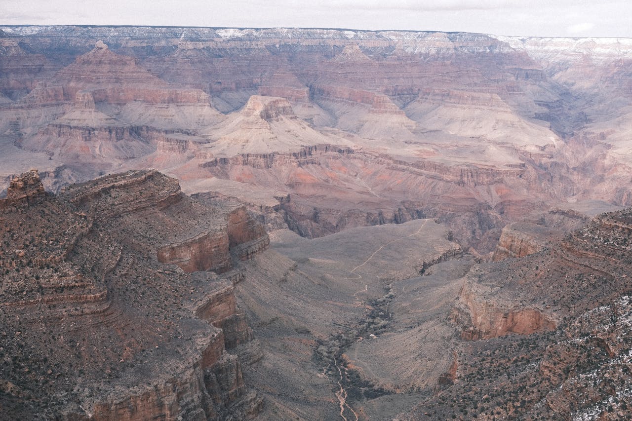 Stunning aerial image capturing the vastness of the Grand Canyon's natural landscape.